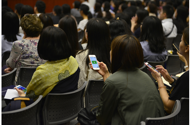 Teachers participated in an interactive LA activity using mobile phones.