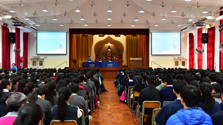 Students listening to the sharing attentively.