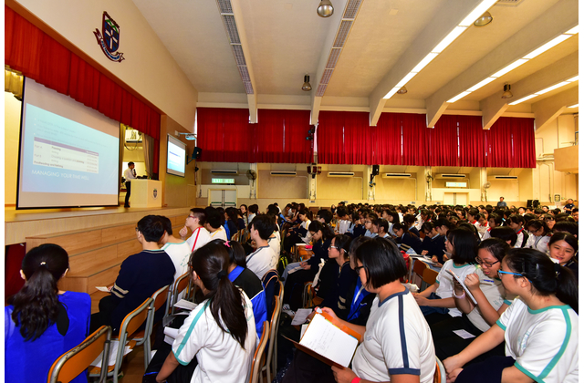 Students listening to the sharing session attentively.