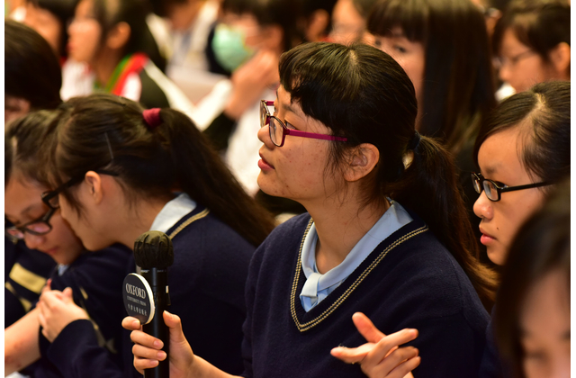 Student asking questions during the Q&A session.