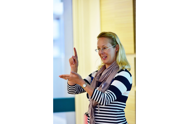 Ms Kempston demonstrating a lively way to read a poem.