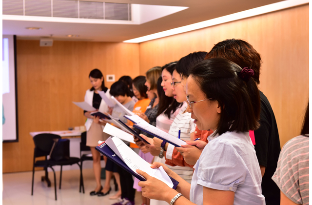 Teachers performing the poem.