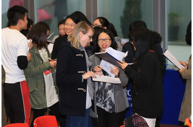 Teachers engaging in group activities with great enthusiasm.