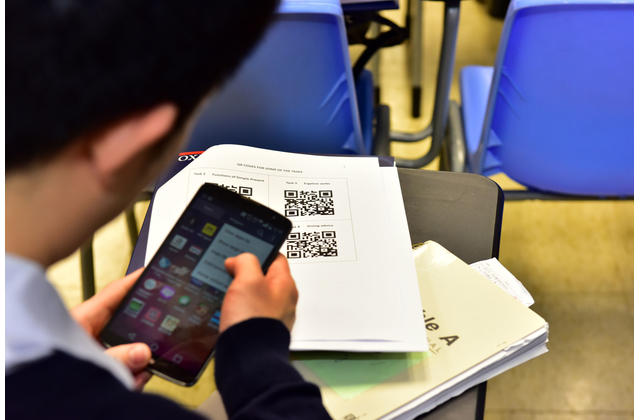 Teachers scan QR codes to join interactive activities