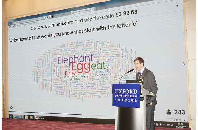 Mr Moorhouse inviting the audience to contribute their ideas in an e-activity.