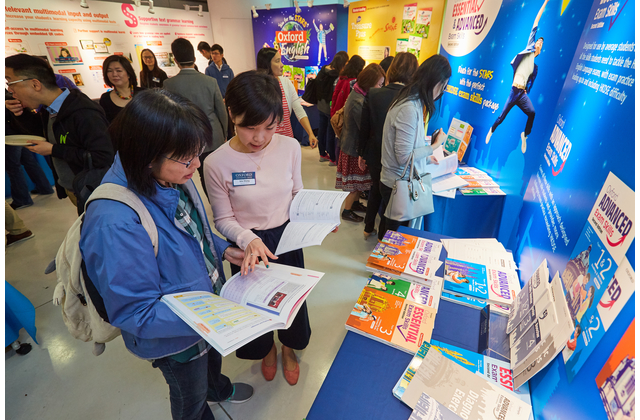 OUP staff walking a teacher through the enhancements made to Oxford Advanced and Essential Exam Skills (Second Edition)